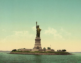 Colorful frontal view of the Statue of Liberty rising above an island in New York Harbor.